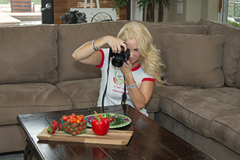 Erin Porter taking picture of food
