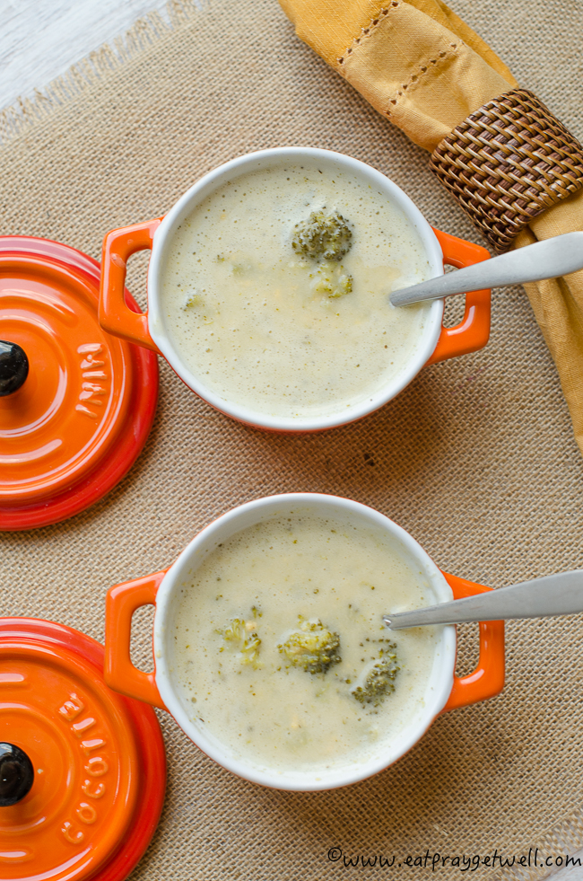 broccoli cheese soup in orange bowls