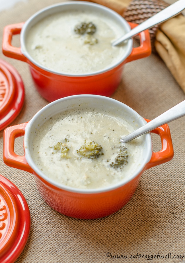 two bowls of broccoli cheese Soup 