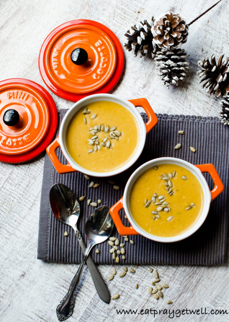 pumpkin soup in orange ramekins