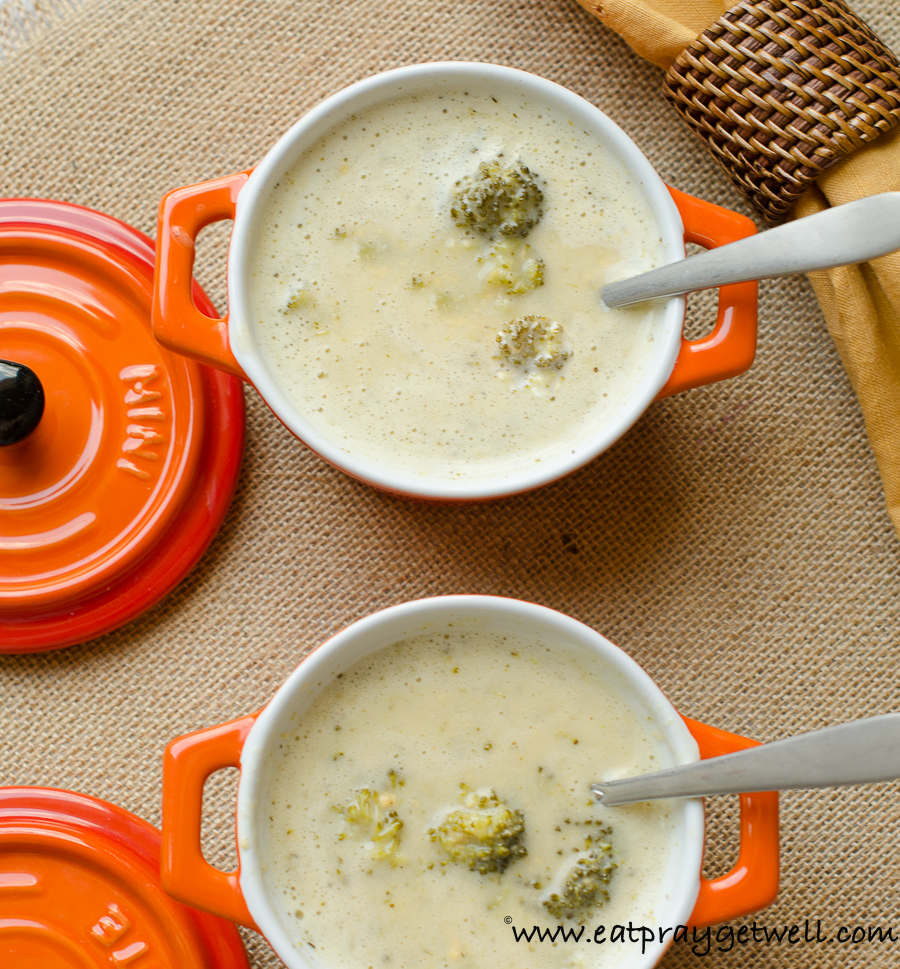 Broccoli cheese soup in orange bowls