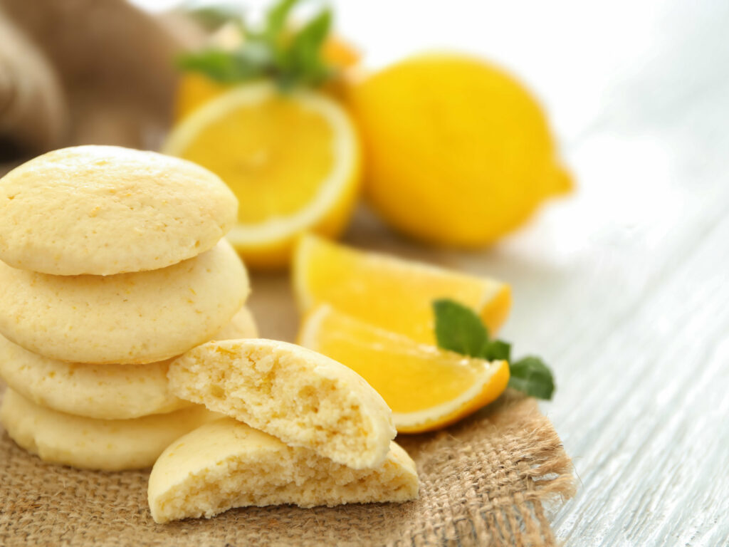 lemon cookies with lemons in background