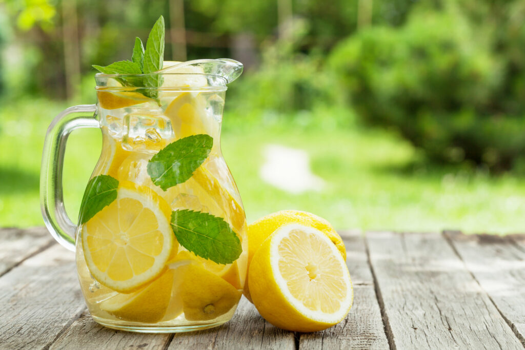 Lemonade pitcher with lemon