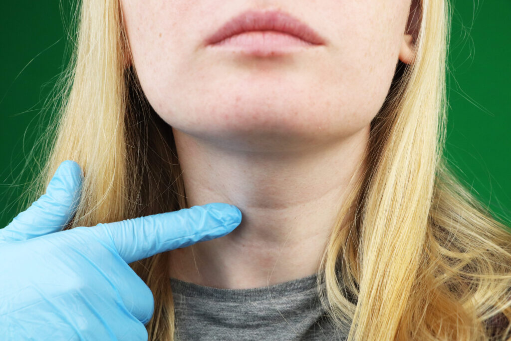 The girl on examination at the doctor. Thyroid